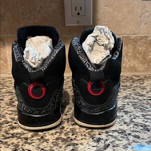 Jordan Kids Black and Red Sneakers with Green Accents